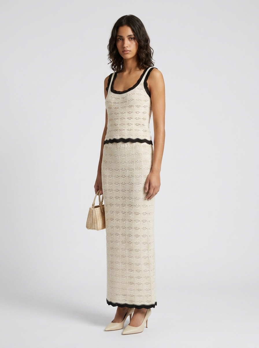 Noiré Knit Vest and Skirt Set — three-quarter view on model