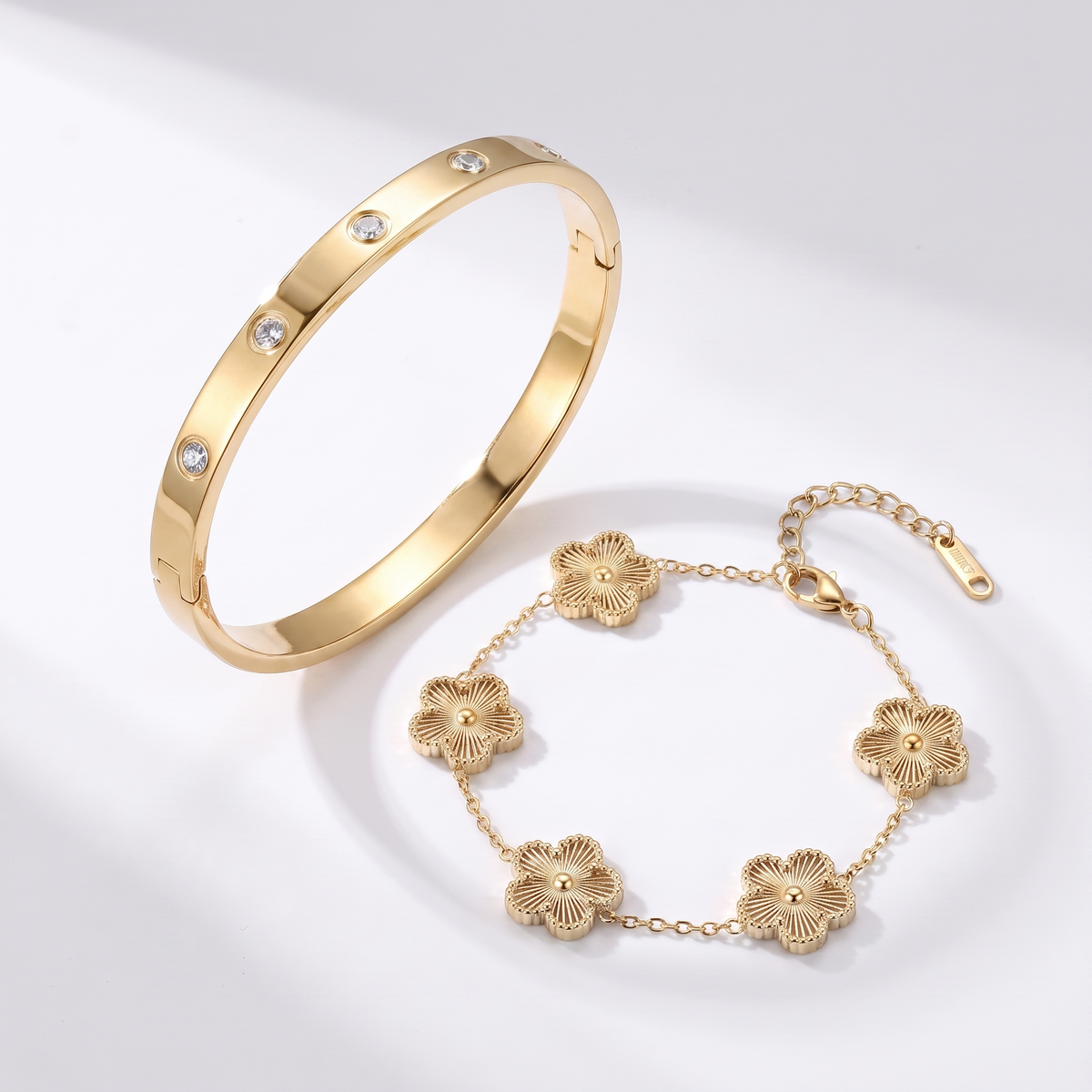 Petaline gold abalone set - bangle and bracelet on white background