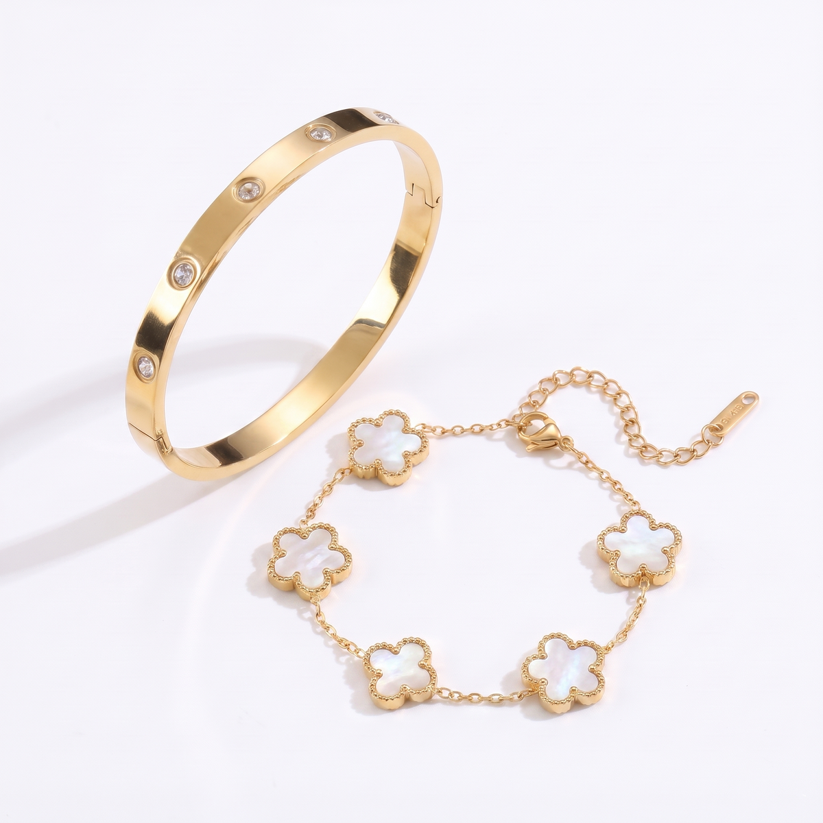Petaline white abalone set - bangle and bracelet on white background